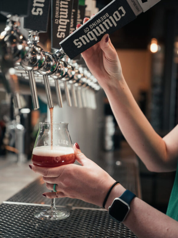 Pouring Raspberry Galette into glass